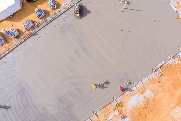 Concrete driveway slab installation compared to asphalt for residential homes in Keller, Texas