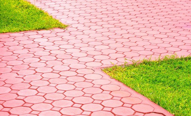 Stamped concrete patio design with decorative pattern for outdoor space in Keller, TX